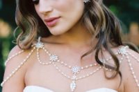 24 ivory pearls and rhinestones make the neckline look very interesting
