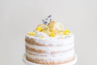 24 lavender and lemon curd chiffon cake, decorated with dried lemon slices, fresh lavender, and edible flower petals
