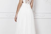 30 wedding dress with cap sleeves, a cutout back with a lace and buttons detail