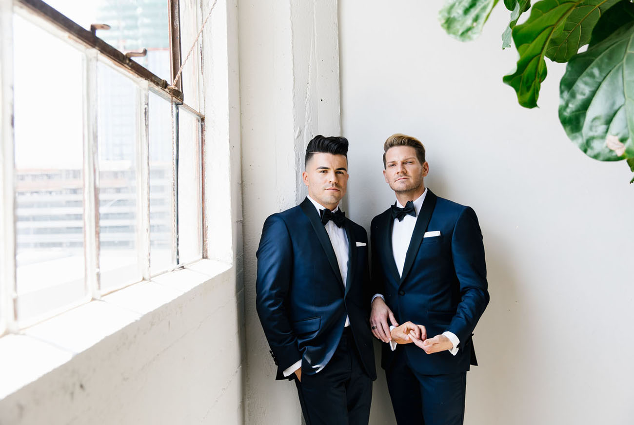 These dapper grooms got married in an industrial venue and turned it into a greenhouse