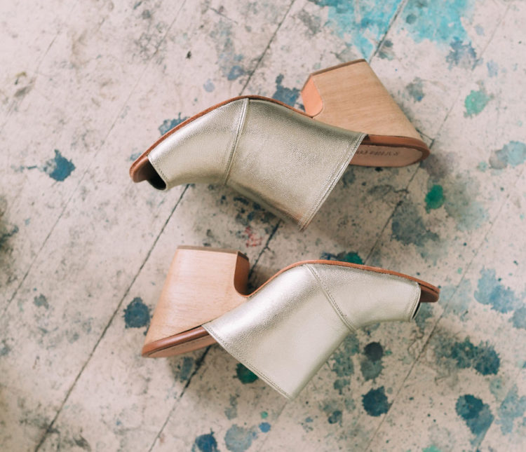 The bride was wearing metallic leather mules that are a unique take on usual heels