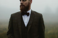 03 The groom was wearing a checked brown tweed suit with a waistcoat and a marsala velvet bow tie