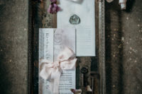 04 The wedding stationery was delicate, with blush ribbons and bows