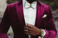 05 a glam groom in a plum-colored velvet tuxedo, a white shirt and an embellished white bow tie