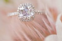 05 a rose gold engagement ring with a cushion pink diamond and a halo for a romantic girl