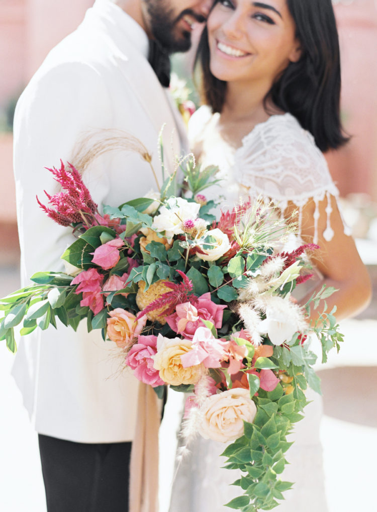 The bridal bouquet was a textural and lush one, with cascading greenery and bold blooms