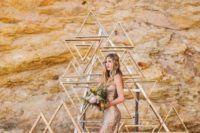 07 a modern geometric backdrop made of wooden triangles is a great idea