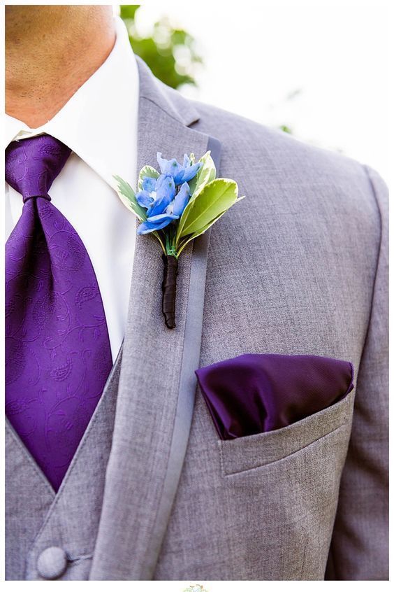 an ultra violet tie and a handkerchief to make the groom's look chic and trendy