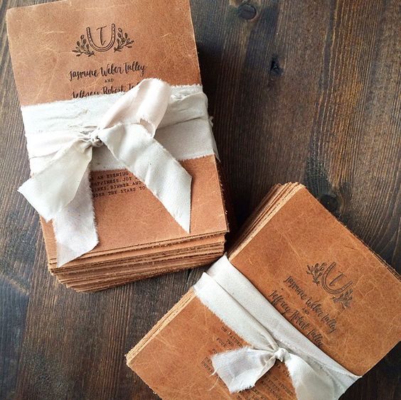 brown leather invitations with letterpressing are amazing for any wedding