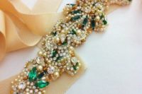 09 a gorgeous embellished bridal sash with pearls, rhinestones and emeralds looks wow