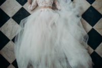 The first dress was a separate, with a lace applique top and a tulle full skirt