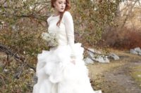 11 a neutral sweater over the wedding dress looks feminine and winter-like