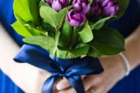 11 a purple tulip bouquet with navy ribbon will do for a summer or spring wedding