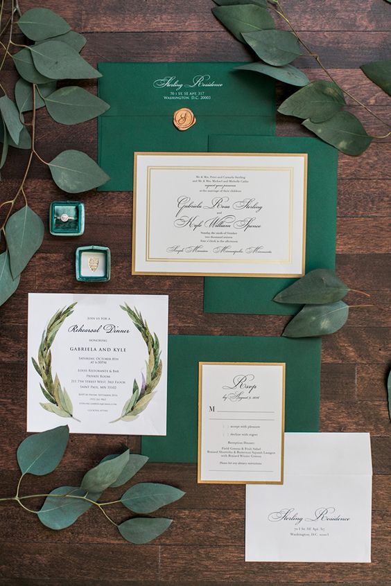 elegant emerald and gold frame wedding stationery and weddign accessories in emerald boxes