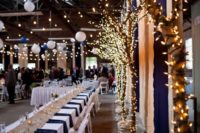 15 potted trees wrapped with lights look fantastic and will make your venue magical