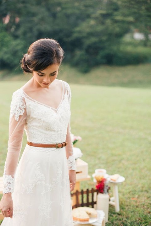 a thin brown leather belt to highlight your waist can fir a boho or rustic bridal look