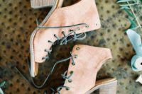 17 tanned leather peep toe booties with lacing up for a boho bride