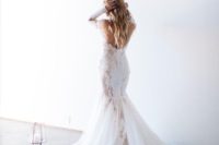 18 a backess lace applique mermaid wedding dress with long sleeves and a long train looks very chic