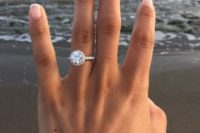 20 a classic round diamond white gold engagement ring with a halo will be loved by many girls