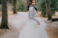 21 a grey comfy sweater over a princess-style wedding dress and a faux fur scarf looks very contrasting