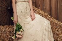 a champagne wedding gown with short sleeves and embellishements for a boho bride