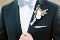 24 a pale blue velvet bow tie refreshes the classic tux look and gives it a spring feel