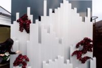 26 an ultra modern wedding backdrop with burgundy orchids inspired by Icelandic landscapes