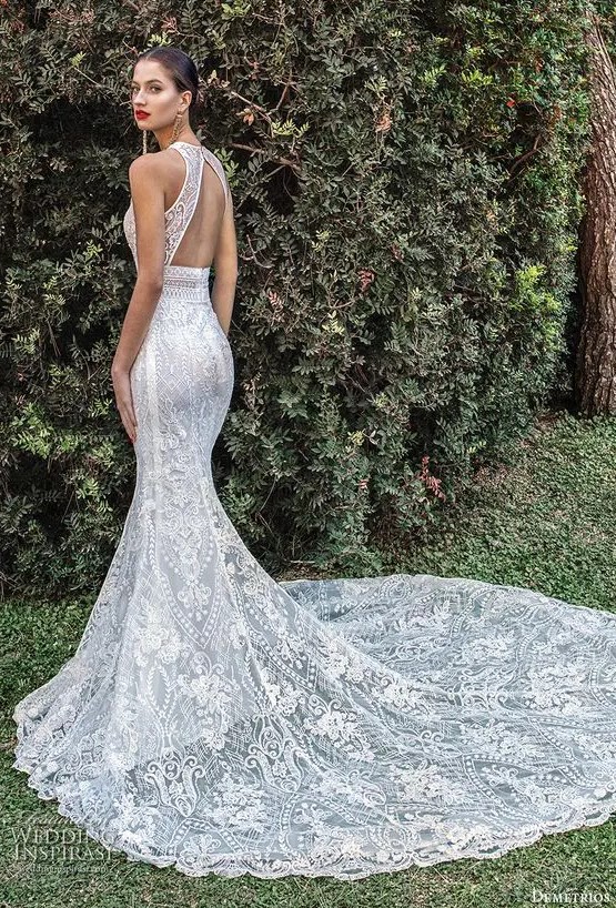 a dreamy keyhole back mermaid wedding dress fully made of lace, with a halter neckline and a train is a statement idea for a modern romantic bride