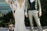 a lace mermaid wedding dress with a plunging neckline, long sleeves, statement earrings and a crown for a bold bridal look