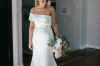 a modern off the shoulder plain mermaid wedding dress with a train is a stylish and eye-catching idea for a modern bride