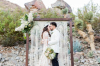 01 This desert boho wedding has a cool palete of neutrals and greenery and took place in California