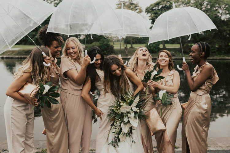 This wedding on a rainy day was filled with tropical leaves and blooms and laughter
