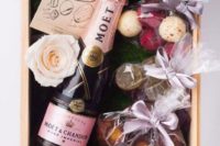 02 a beautifully assembled gift box featuring champagne, flowers, chocolate and macarons – just add a tag