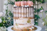 02 a naked cake with chocolate drip, meringues, pink macarons and gold leaf