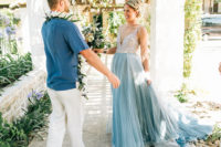 03 The bride was wearing a beautiful illusion back and neckline wedding dress with an embellished bodice and an aqua blue skirt