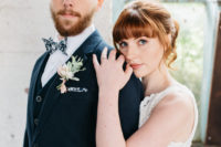 04 The groom was wearing a navy three-piece suit with a printed bow tie and a cute boutonniere