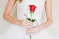 04 a single red rose is an elegant and timeless idea for any bride and any bridal style