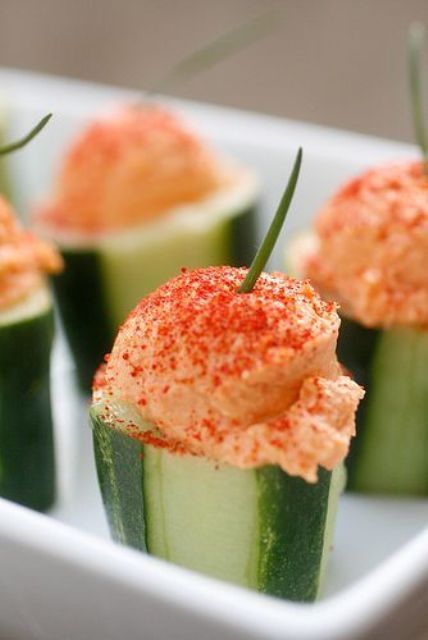 red pepper hummus in cucumber cups is a refreshing idea for a spring appetizer