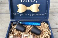 05 a navy box with cups, alcohol and some other stuff your bro may like