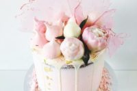 05 a semi-naked wedding cake with drip, blush blooms, blush meringues and pink sugar shards