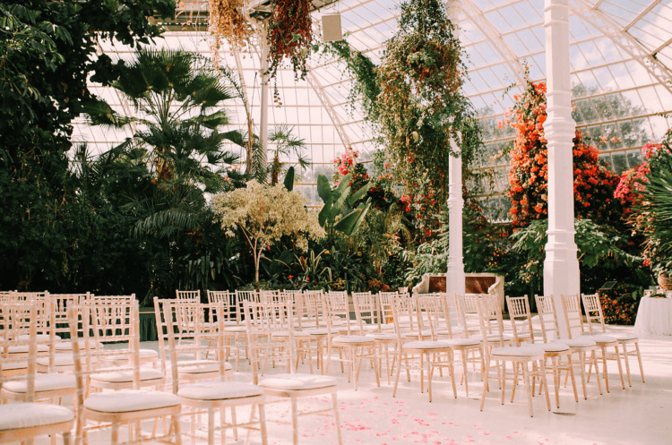 The ceremony took place in a botanical greenhouse