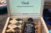 07 a box with whiskey, a cigar, a cigar cutter and a wallet for a stylish groomsmen proposal