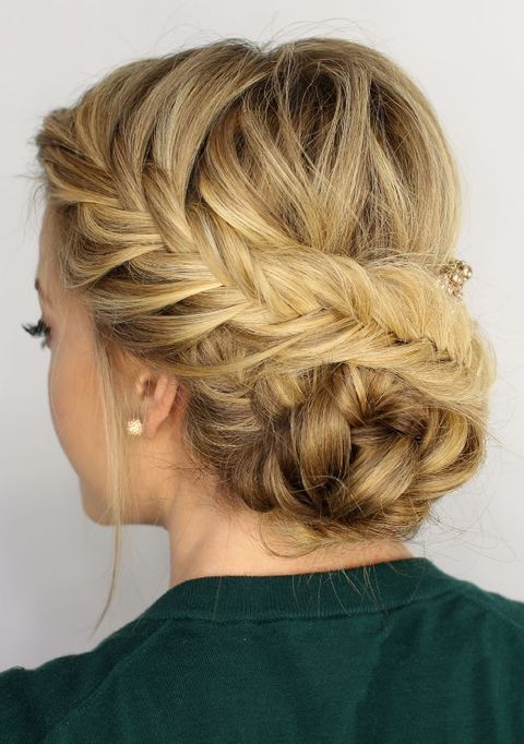 a braided updo with a low braided bun is a timeless idea that suits many styles