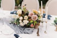 07 a spring tablescape with navy napkins and moody florals plus touches of grey