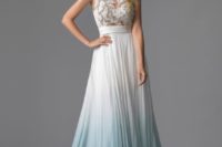 07 sleeveless wedding dress with a lace applique embellished bodice and an ombre blue skirt with a train