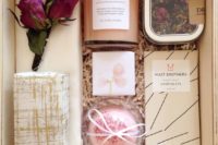 08 a chic box with dried flowers, some spa soap, a candle, dried petals and chocolate