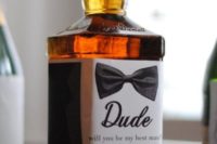 08 a whiskey bottle with a personalized label is a cool idea to pop up the question