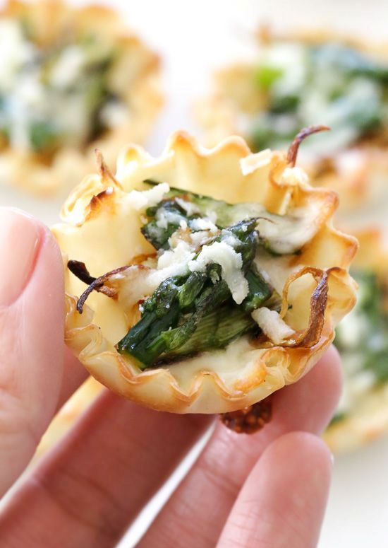 asparagus and caramelized onion tartlets are an easy and delicious spring appetizer