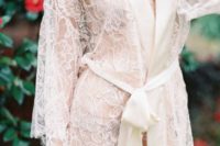 10 an off-white floral lace short bridal robe with long sleeves, a silk ribbon trim and a matching sash