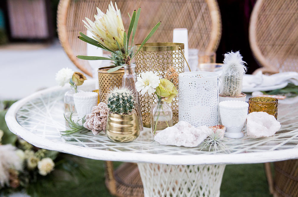 The wedding tables were styled with cacti, proteas, blooms and candles